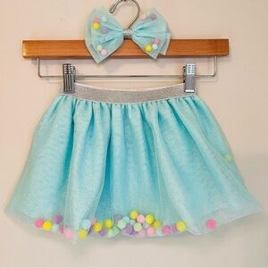 Little Me Turquoise Skirt with Rainbow Poms Silver Waistband & Matching Bow set